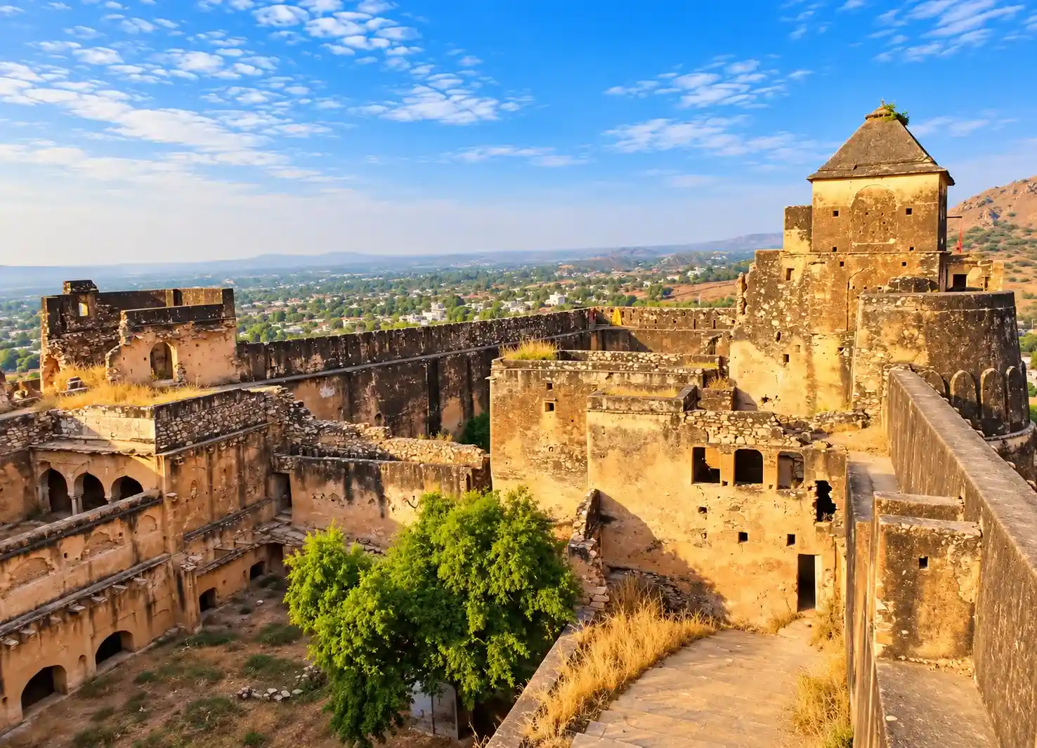 Ancient Fortress Overlooking Green Valley (1)
